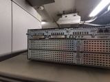 an image of a rack of servers in a room