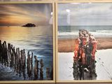 two pictures hanging on the wall next to each other