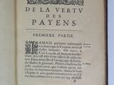 a book open to a page with a picture of a bird