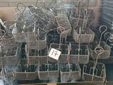 a pile of baskets that are sitting on a table