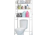 a white toilet with a shelf above it next to a toilet