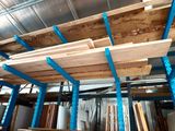 a room that has a lot of wood on the floor