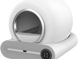 an image of a small white object sitting on top of a stand