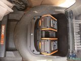 two batteries are sitting in the back of a vehicle