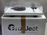 a white box with a record player inside of it