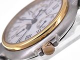 a close up of a wrist watch with a clock on it