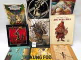 a lot of books that are sitting on a table