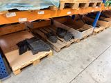 many different types of tools on the pallets in the warehouse