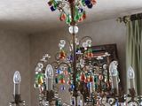 a chandelier hanging from the ceiling in a room