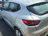 a silver car parked on the side of the road