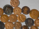 a lot of coins that are sitting on a table