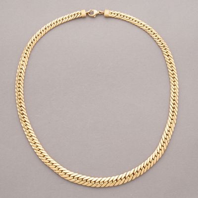 an 18k yellow gold curbet necklace