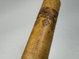 a baseball bat with a design on it on a table