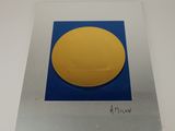 an image of a picture of a yellow object on a blue surface
