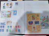 a book with stamps on it sitting on a table