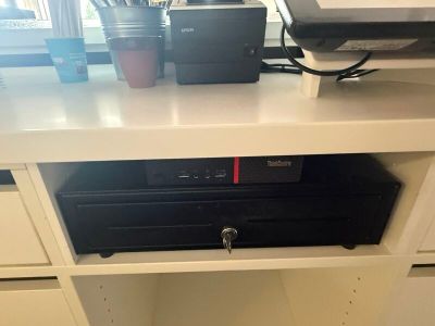 an image of a computer and printer on a desk