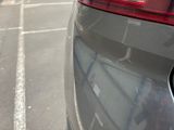 a car that is parked on the side of the street