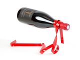 a bottle of wine with a red ribbon tied around it