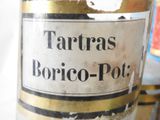 a bottle of tartras borico - pot sitting on a table