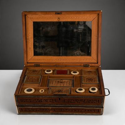 a wooden box with a mirror in it on a table