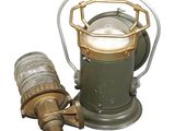 a small lantern that is sitting on top of a table