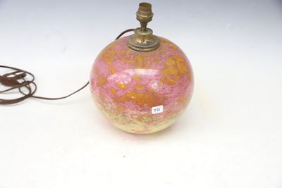 a lamp that is sitting on a table with a cord attached to it