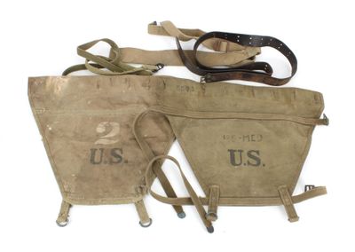 an image of a pair of old canvas bags sitting on top of a white surface