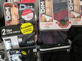 several pairs of men ' s underwear are on display in a store