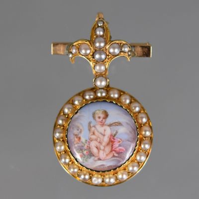 a picture of a cross with a picture of a baby on it