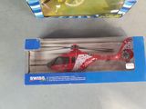 a toy helicopter that is in the box