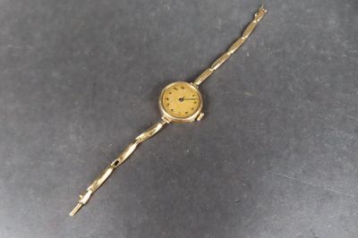 Montre de dame, boîtier et bracelet en or 14K (585/1000e) (p…