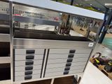 a lot of drawers that are in a store