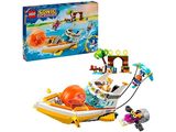 a box of legos with a toy boat and a box of legos