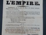 an old poster with a black and white image of a man holding a knife