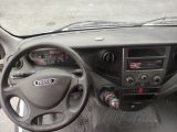 dashboard of a car with a steering wheel and dashboard controls