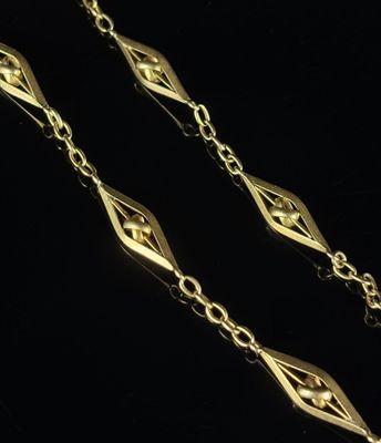 a pair of gold plated chain with a diamond cut design