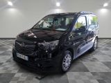 a picture of a black van in a garage
