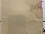 a piece of paper that has been torn off on a table