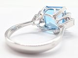 a ring with a blue topaz stone in it