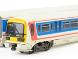 a toy train that is sitting on the tracks