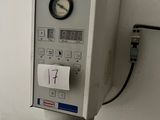 an image of a control panel with a clock on it
