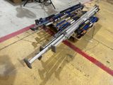 a pile of skis and poles sitting on the floor