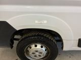 a close up of a truck tire with a sticker on it
