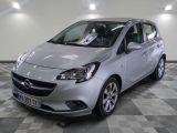 a picture of a silver opel parked in a garage