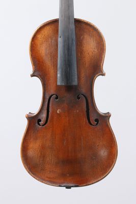 an old violin with a bow on a white background