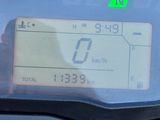 a close up of a motorcycle with a digital display on it