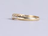 an image of a gold ring with a diamond