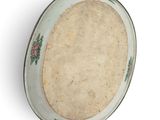 a white plate with a floral design on it