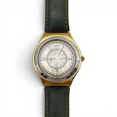 an image of a close up of a wrist watch on a white surface