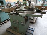 a machine that is sitting on a pallet in a room
